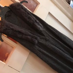 Sweater Vest with fur around the collar.